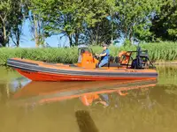 Жорсткий надувний човен для продажу